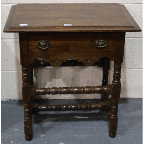 2066 - A Victorian oak single drawer lamp table raised on turned supports, 69 x 45 x 70 cm H. Not available... 