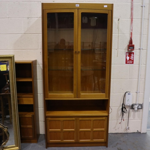 2067 - Nathan Squares illuminated display cabinet, two doors and three glass shelves above a two-door cupbo... 