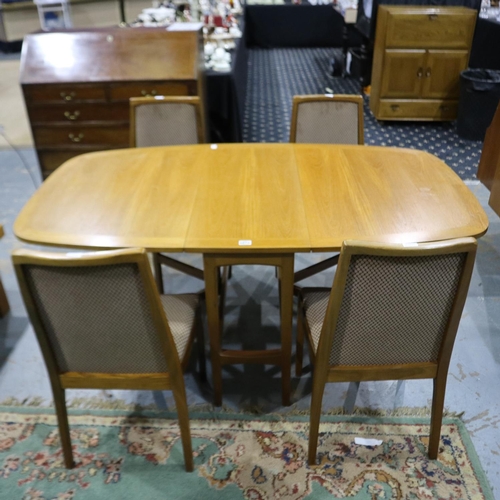 2070 - Nathan dining suite, comprising a drop-leaf table (175 x 99 x 175 xm H open) and a set of four dinin... 