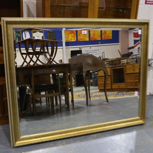 2081 - Large contemporary gilt framed bevelled edge mirror, 103 x 130 cm. Not available for in-house P&P