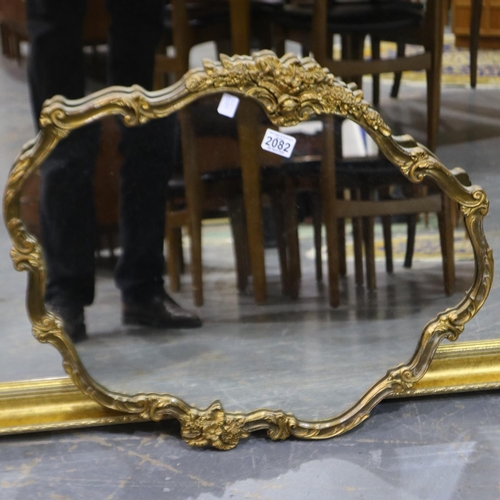 2082 - A 20th century Baroque style gilt framed wall mirror, 67 x 55 cm. Not available for in-house P&P