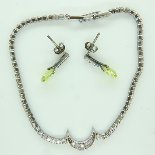 106 - Silver peridot set earrings and white metal stone set bracelet, L: 16 cm. UK P&P Group 1 (£16+VAT fo... 