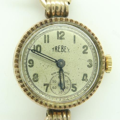 119 - 9ct gold ladies wristwatch by Trebex on a yellow metal bracelet, total weight 15.0g. UK P&P Group 1 ... 