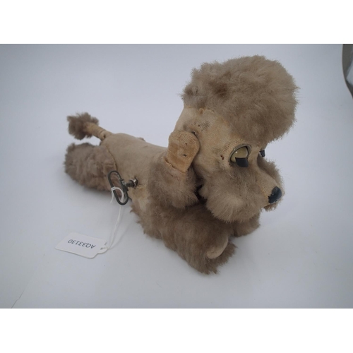 2441 - 1950's Cragstan clockwork Sleepy Poodle, working. UK P&P Group 1 (£16+VAT for the first lot and £2+V... 