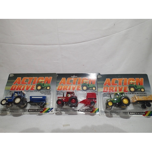 1156 - Britains Action Drive 3 carded diecast models by Britains, appearing in excellent condition on VG ca... 