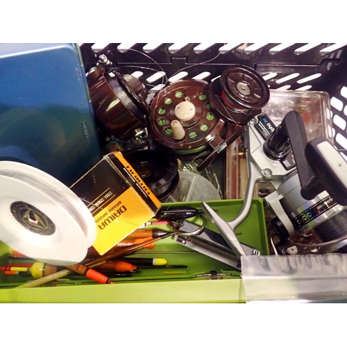 1109 - Mixed fishing equipment, including lures, reels, weights and floats. Not available for in-house P&P