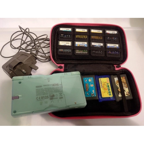 1112 - Nintendo DS Lite and thirty games with case and charger. UK P&P Group 2 (£20+VAT for the first lot a... 