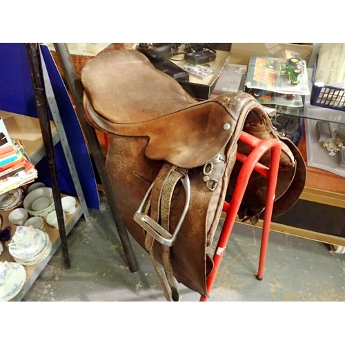 1191 - Leather general purpose riding saddle with stirrups and stirrup leathers. Not available for in-house... 