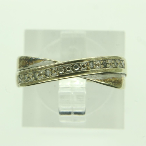 61 - 9ct gold crossover ring set with diamonds, size K, 2.0g. UK P&P Group 0 (£6+VAT for the first lot an... 