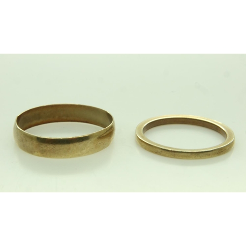 69 - 9ct gold wide band ring, size M/N, with a further 9ct gold band ring(mis-shaped), combined 3.2g. UK ... 