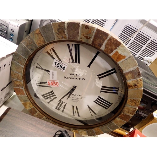 1564 - Circular stone cased wall clock. Not available for in-house P&P