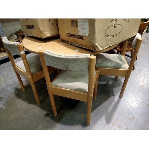 1767 - Circular beech table, with 4 chairs, 74 x 105cm L. Not available for in-house P&P