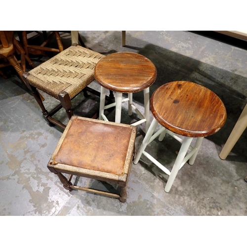 1769 - Four stools to include strung woven foot stool. Not available for in-house P&P