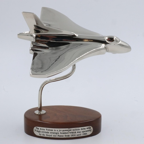 401 - Chrome Vulcan bomber on wooden base, L: 19 cm. UK P&P Group 2 (£20+VAT for the first lot and £4+VAT ... 