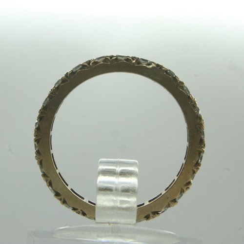 15 - 9ct gold stone set eternity ring, unmarked, size N, 2.2g. UK P&P Group 0 (£6+VAT for the first lot a... 