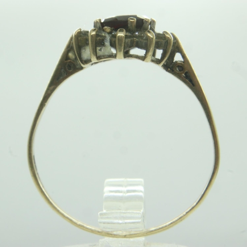 28 - 9ct gold ring set with garnet and cubic zirconia, size U, 2.2g. UK P&P Group 0 (£6+VAT for the first... 