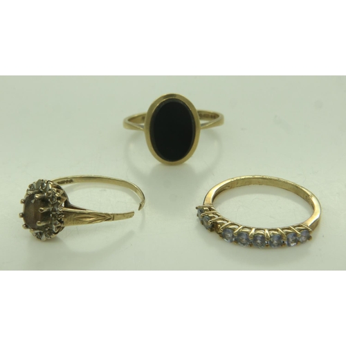 39 - 9ct gold signet ring set with a panel of onyx (mis-shapen), 9ct gold half eternity (lacking one ston... 