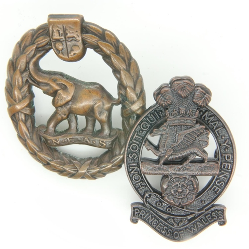 2166 - South African WWII Native Military Corps cap badge and a contemporary Princess of Wales' Own Regimen... 