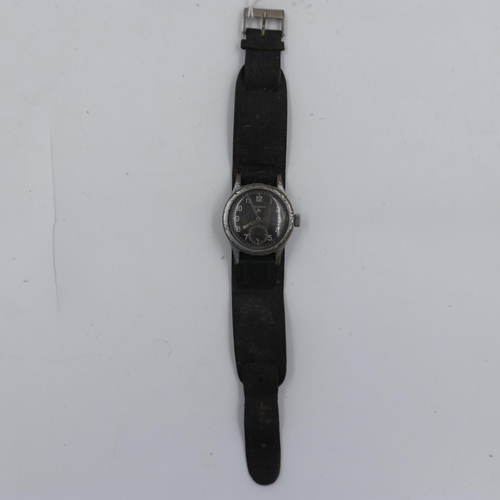 2051 - RECORD: A WWII British military issue stainless steel 'Dirty Dozen' wristwatch head, marked on caseb... 