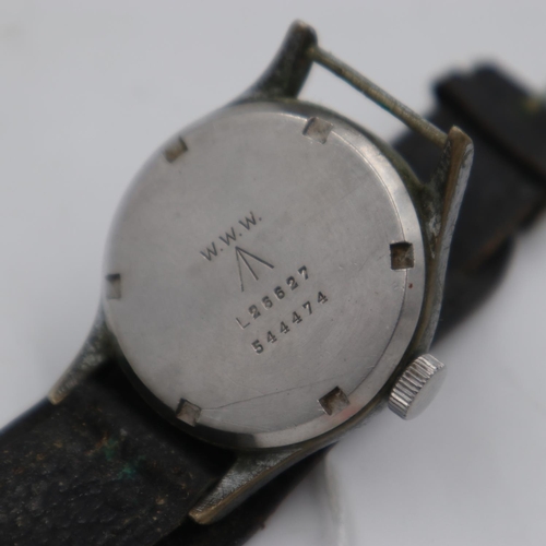 2051 - RECORD: A WWII British military issue stainless steel 'Dirty Dozen' wristwatch head, marked on caseb... 