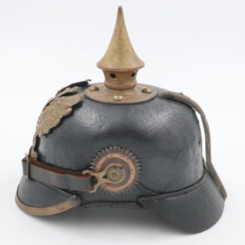 2081 - WWI 1895 model Imperial German pickelhaube with chinstrap and cockades. unit marked to the 70th Rhen... 