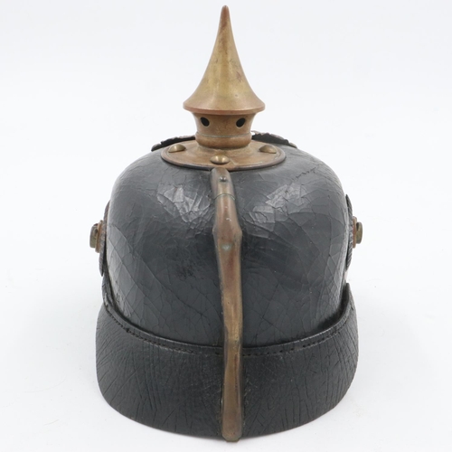 2081 - WWI 1895 model Imperial German pickelhaube with chinstrap and cockades. unit marked to the 70th Rhen... 