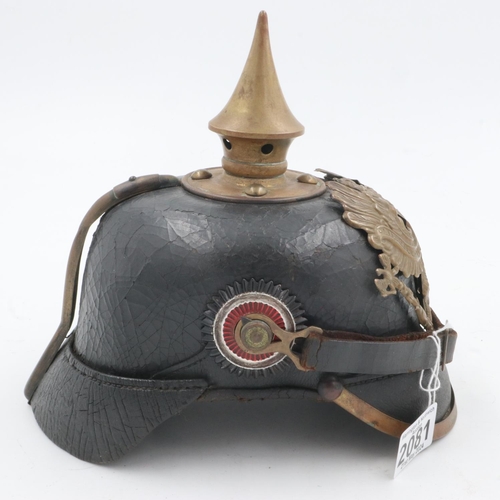 2081 - WWI 1895 model Imperial German pickelhaube with chinstrap and cockades. unit marked to the 70th Rhen... 