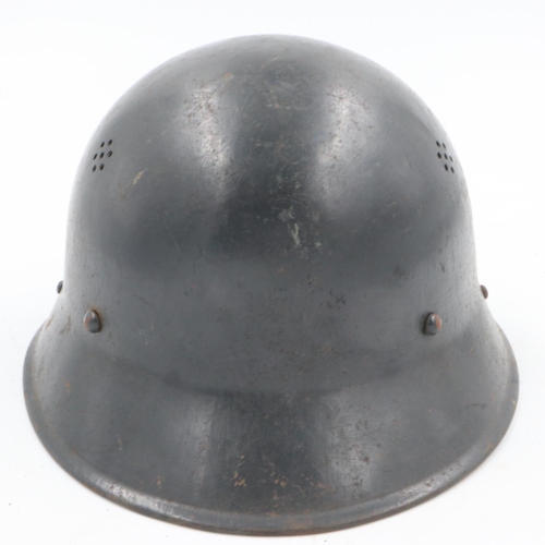 2094 - WWII captured-Czech M30 Helmet used by the German RLB (Air Raid Warden). Besides the re-cycling elem... 