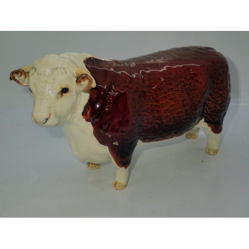 236 - Beswick Hereford bull, no cracks or chips, L: 21 cm. UK P&P Group 2 (£20+VAT for the first lot and £... 