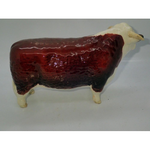 236 - Beswick Hereford bull, no cracks or chips, L: 21 cm. UK P&P Group 2 (£20+VAT for the first lot and £... 