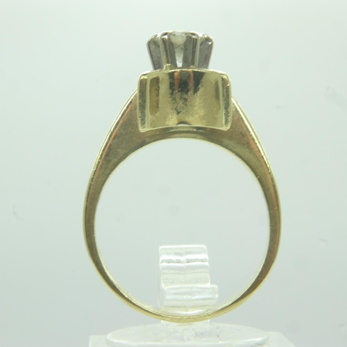 11 - 18ct gold solitaire diamond ring, unusual raised claw setting with the bright stone approximately 0.... 