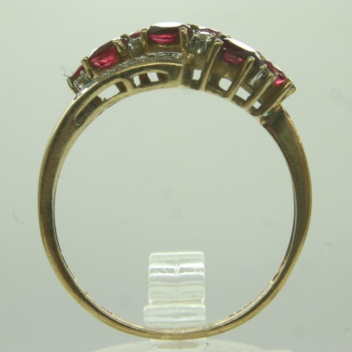 13 - 9ct gold ring set with rubies and diamonds, size U, 2.8g. UK P&P Group 0 (£6+VAT for the first lot a... 