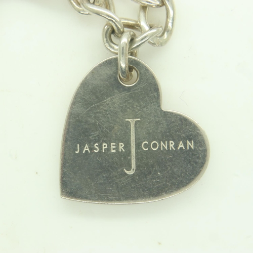 25 - Jasper Conran silver charm bracelet, L: 20 cm, 30g. UK P&P Group 0 (£6+VAT for the first lot and £1+... 