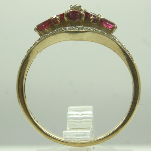 30 - Modern 9ct gold ring set with rubies and diamonds, size T, 3.1g. UK P&P Group 0 (£6+VAT for the firs... 