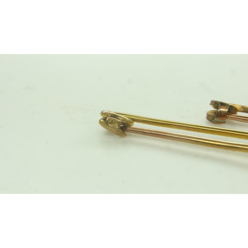 4 - Two 9ct gold pin brooches, largest L: 40 mm, combined 3.7g. P&P Group 0 (£6+VAT for the first lot an... 