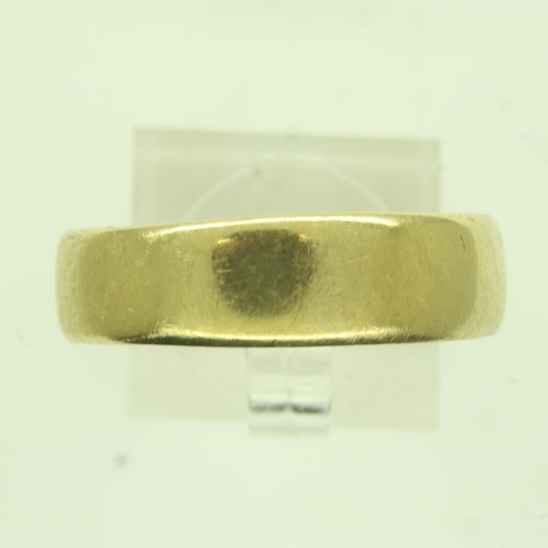 40 - 18ct gold wide profile wedding band, size Y (mis-shapen), 5.4g. P&P Group 0 (£6+VAT for the first lo... 