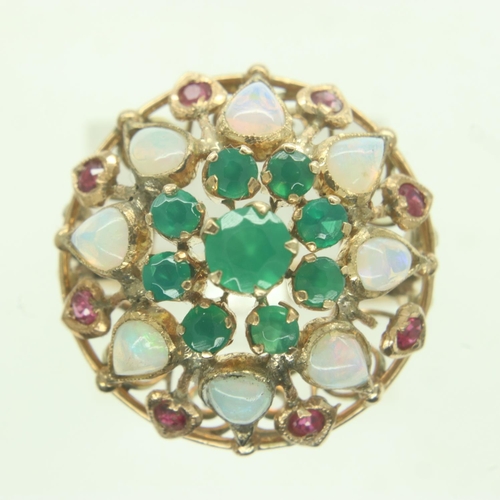 42 - Eastern 14ct gold target ring, set with a multitude of emeralds, teardrop opals and rubies, size P, ... 