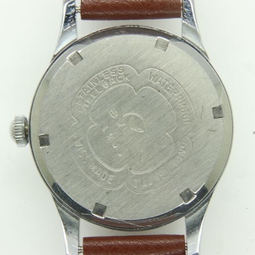 63 - BULER: 21 jewel gents steel cased wristwatch, with date aperture, on brown leather strap, working at... 