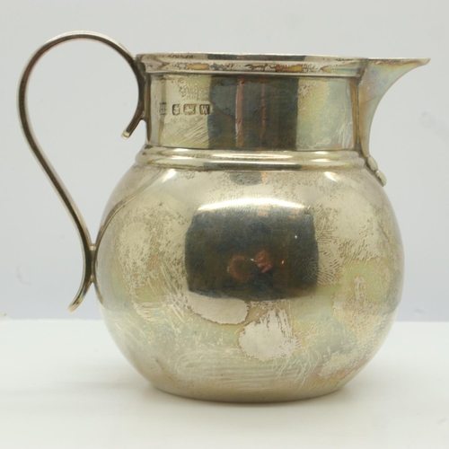 69 - Hallmarked silver cream jug, 119g, H: 80mm. UK P&P Group 1 (£16+VAT for the first lot and £2+VAT for... 