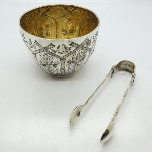 82 - Hallmarked silver boxed bowl in the Canton style, relief decorated with gilt washed interior and a p... 