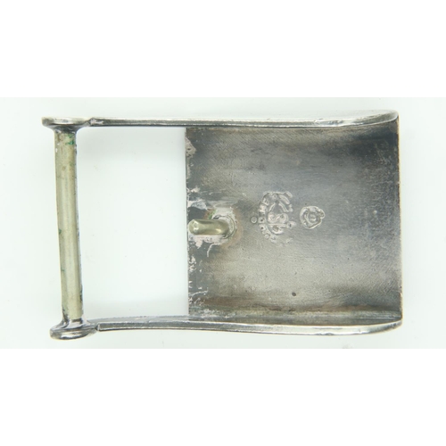 85 - A white metal buckle, decorated in relief with an image of Aries, stamped verso (indistinct). UK P&P... 