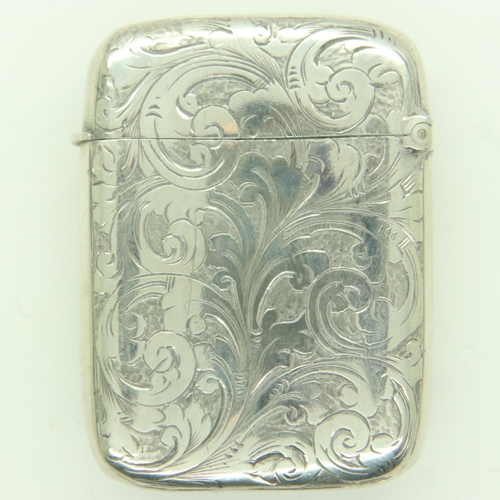 86 - Hallmarked silver vesta case with chased decoration, 33g. UK P&P Group 1 (£16+VAT for the first lot ... 