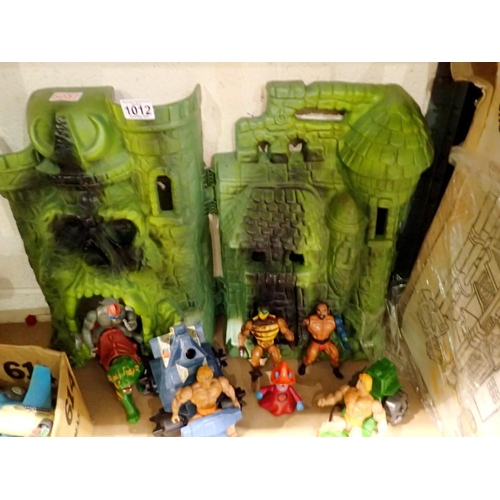 1012 - Masters Of The Universe, by Mattell, Castle Greyskull, Road Ripper, Battle Ram and seven figures, in... 