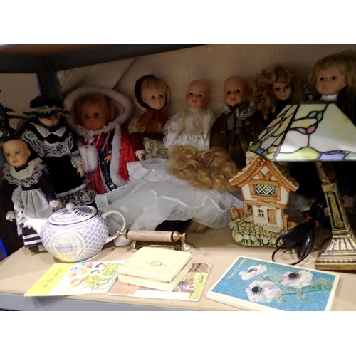 1017 - Six mixed porcelain dolls, Tiffany style lamp etc. Not available for in-house P&P