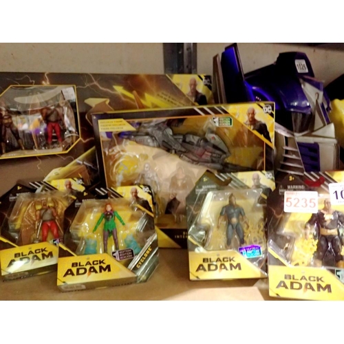 1032 - Six boxed Black Adam figures and vehicles in near mint condition by Spin Master Toys. Not available ... 