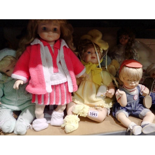 1041 - Shelf of bears and porcelain dolls. Not available for in-house P&P