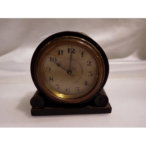 1052 - Miniature mahogany clock, working at lotting up. UK P&P Group 1 (£16+VAT for the first lot and £2+VA... 