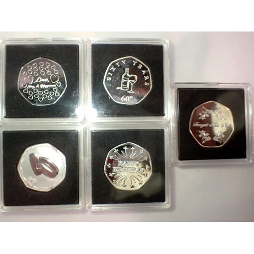 1054 - Five 50p commemorative coins in Quadrium cases. UK P&P Group 0 (£6+VAT for the first lot and £1+VAT ... 