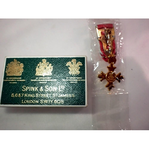 1085 - Spink & Co, miniature OBE medal in original box. UK P&P Group 1 (£16+VAT for the first lot and £2+VA... 