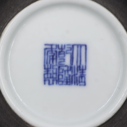 260 - Pair of Chinese blue and white covered bowls with dragon decoration, each raised on a wooden stand, ... 